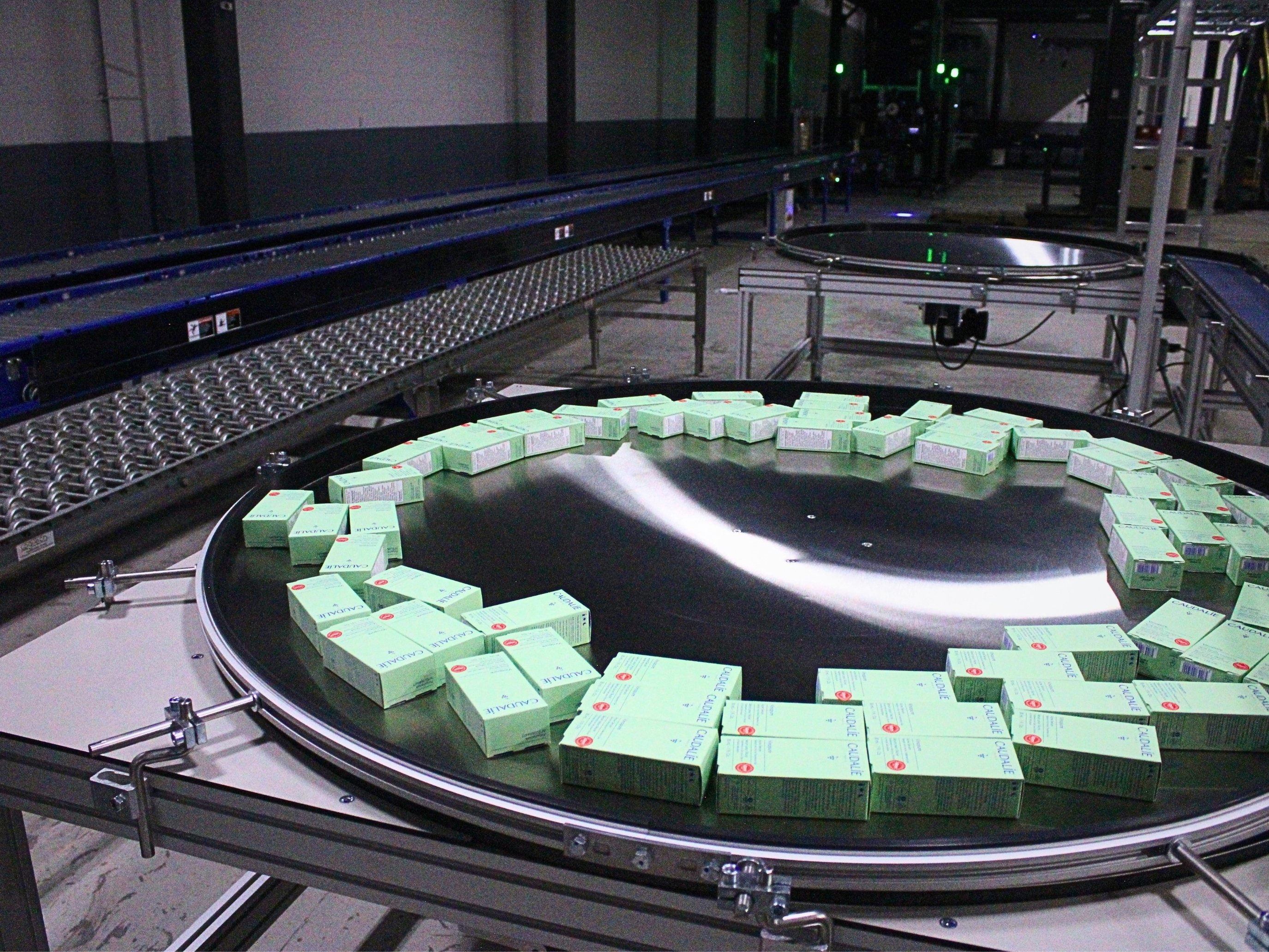 Caudalie products arranged around a circular accumulation table